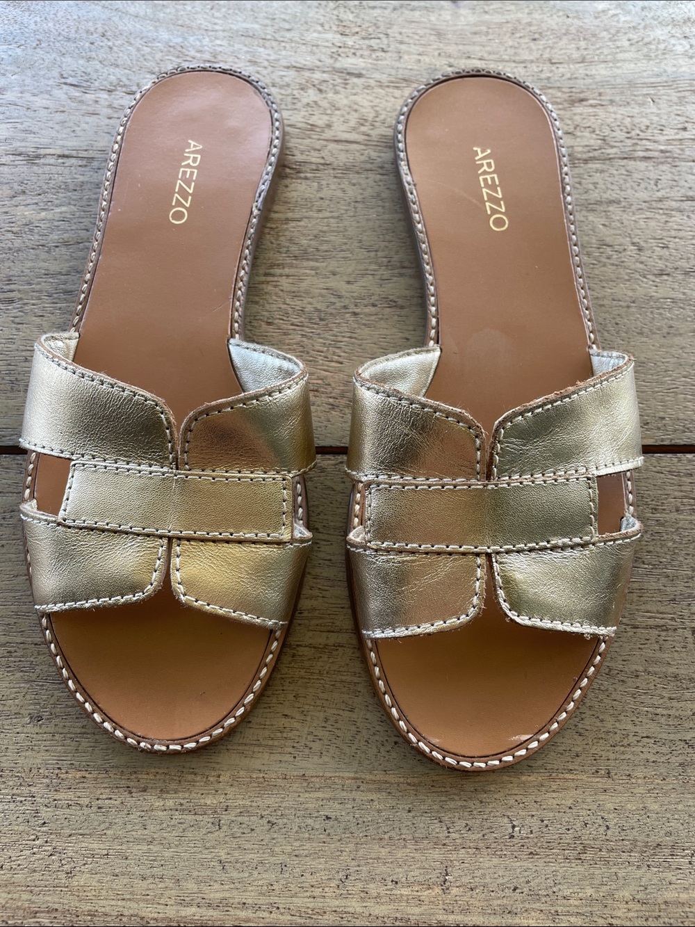 Arezzo Women's Metallic Gold Slide Sandals
Genuine leather